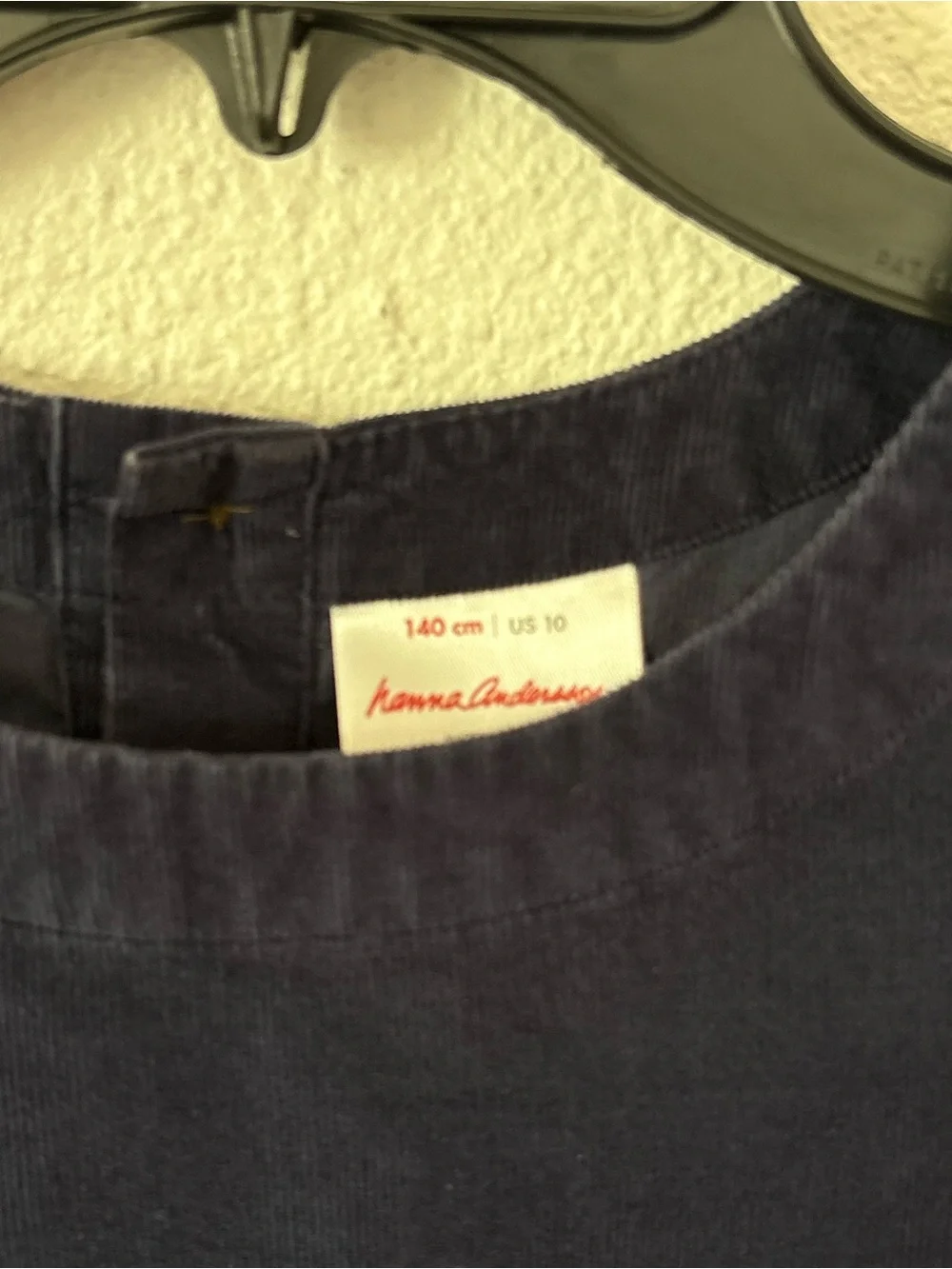 Hanna Andersson Fit & Flare Cotton Corduroy Dress in navy blue.